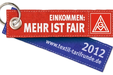 Einkommen: Mehr ist fair - Stofflabel zur Textil-Tarifrunde 2012, farbig 12 cm
